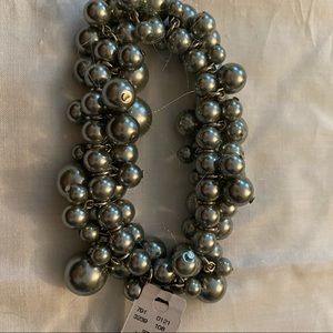 Faux mixed size gray pearl bracelet from The Limited